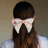 Lele Sadoughi Barrettes IVORY CHICAGO CUBS LELE X MLB BOW BARRETTE